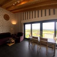 Wohnzimmer mit Panorama Fenster